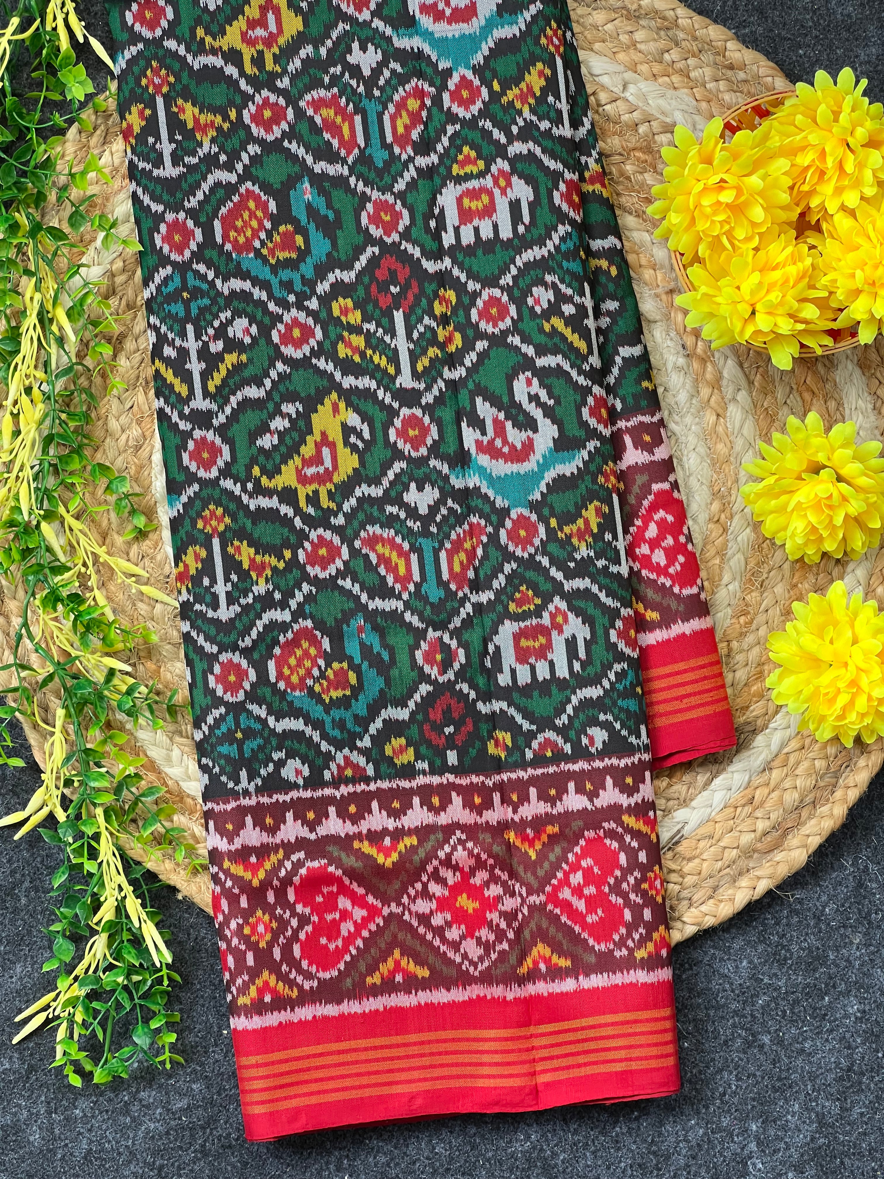 Green Motif Traditional Design Handwoven Patola Silk Saree Main image