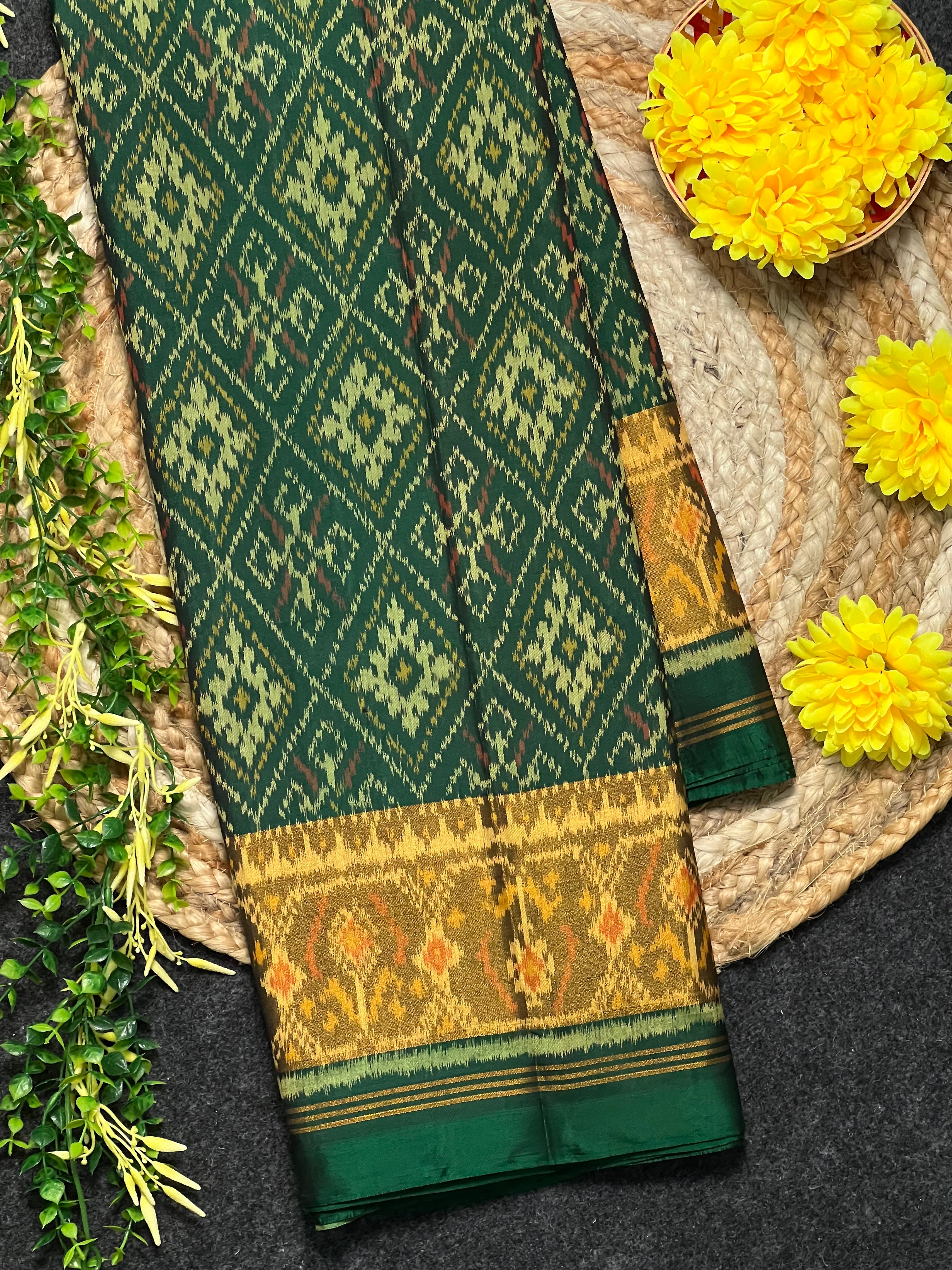Pan-Chanda Green Traditional Design Handwoven Patola Silk Saree Main image