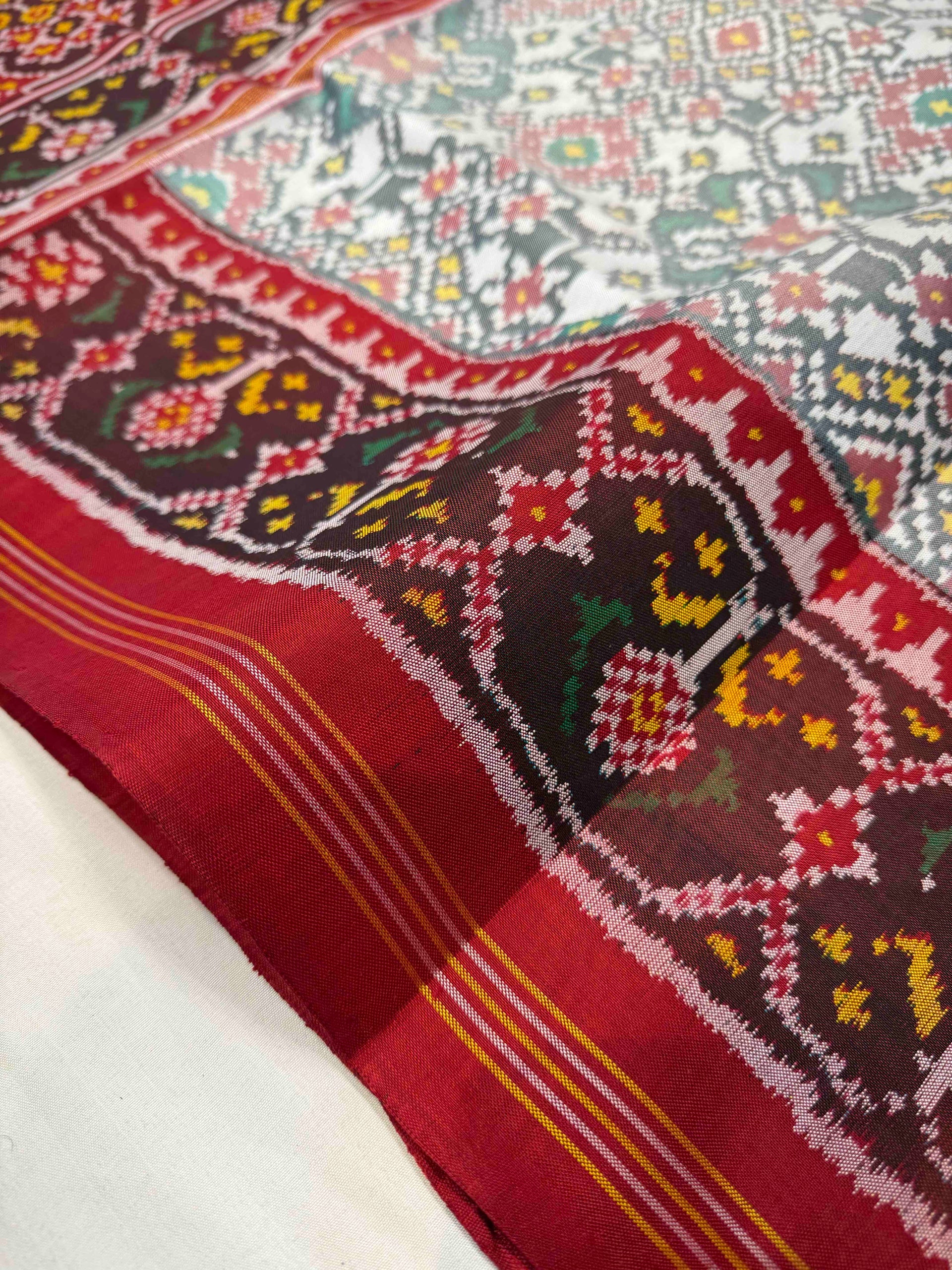 White Navratna Traditional Design Handwoven Patola Silk Saree