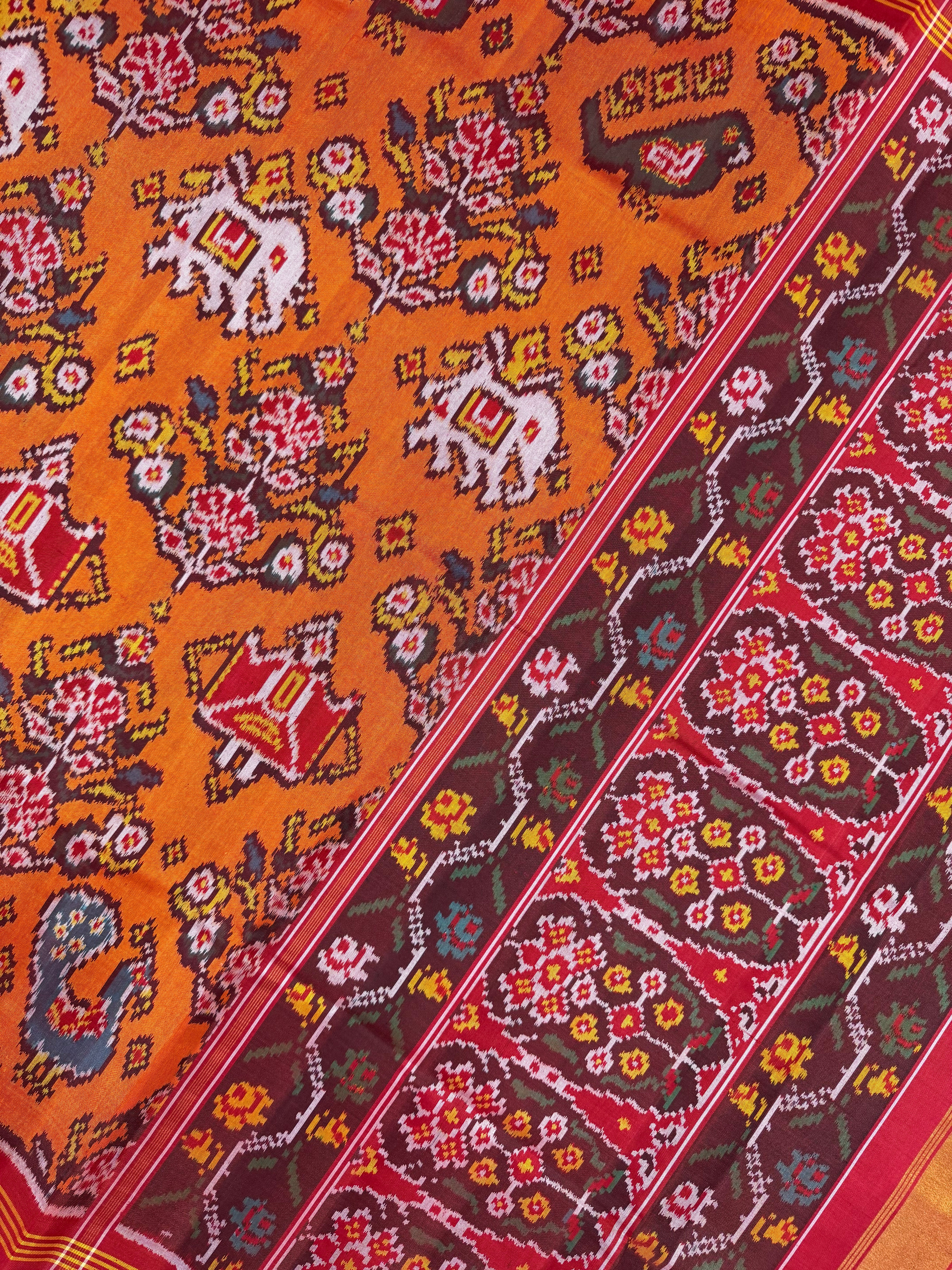 Orange with Motifs Design Handwoven Patola Silk Saree Secondary image